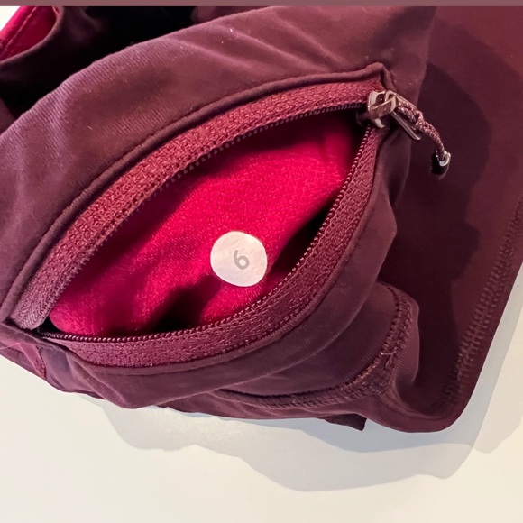 lululemon | Inspire Crop | size 6 | Maroon | rip on leg - Picture 6 of 7